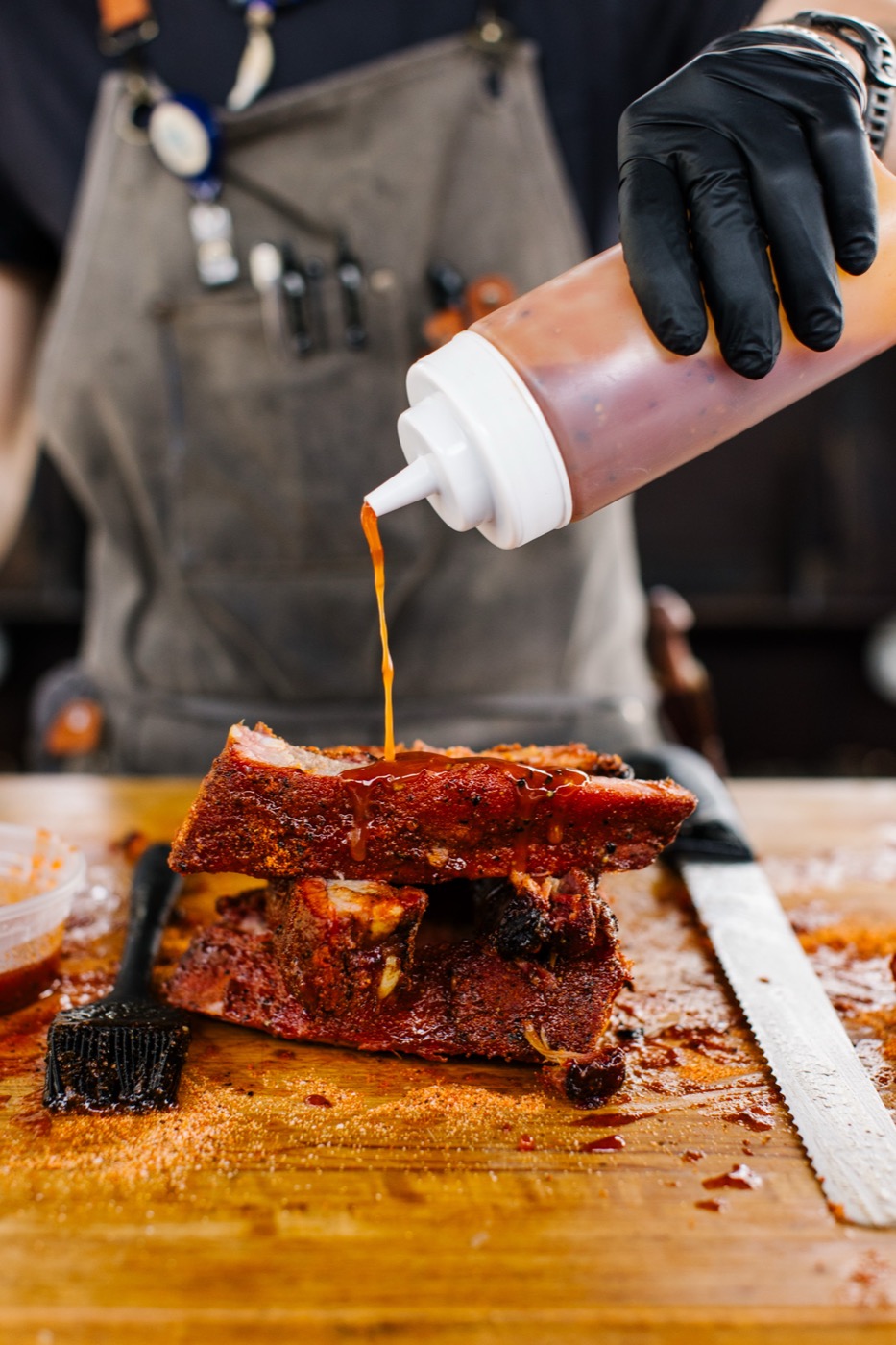 Sauce going onto the board